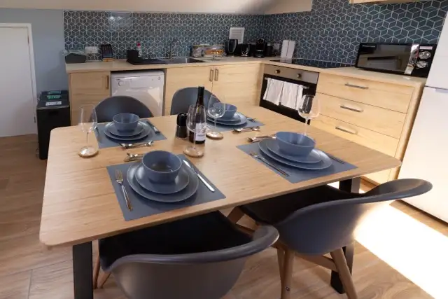 Fully equipped high-spec kitchen at The Studio Cheddar — premium appliances, Scandinavian design and chef-ready setup in a luxury self-catering retreat near Cheddar Gorge, Somerset
